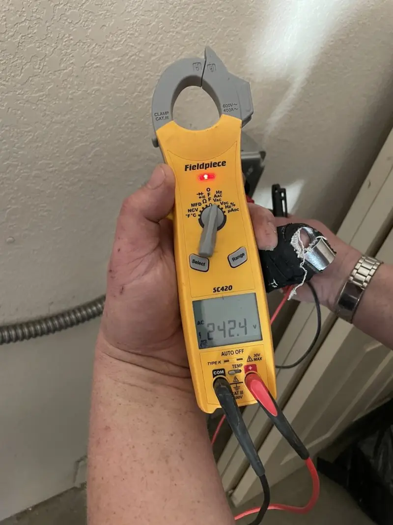 Voltage testing with clamp meter during Aluminum Wiring Replacement in Woodville